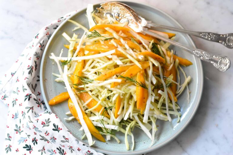 A simple winter salad of mango, white cabbage and dill