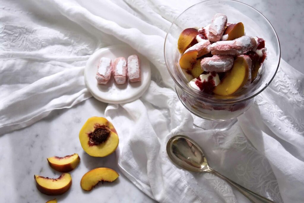 My Champagne-soaked peach melba trifle